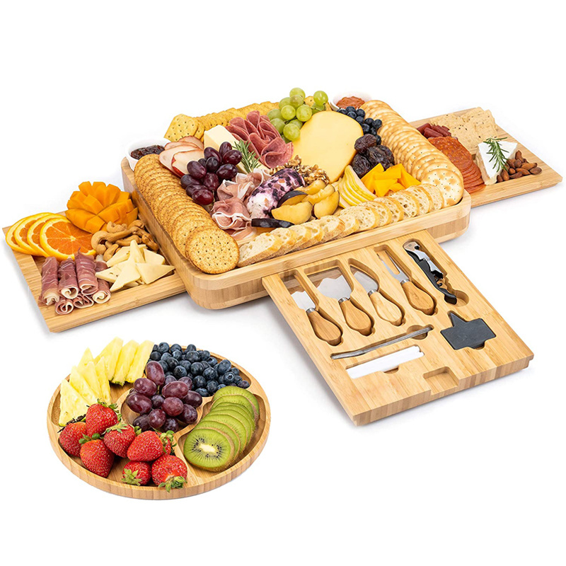 Bamboo cheese serving board with knives