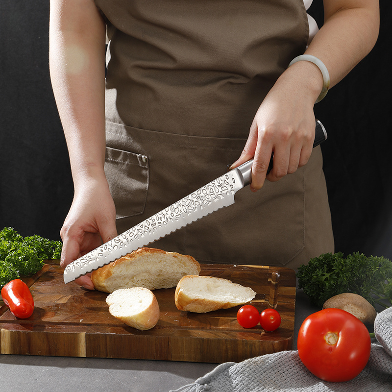 Preparing bread with a kitchen knife on a wooden board